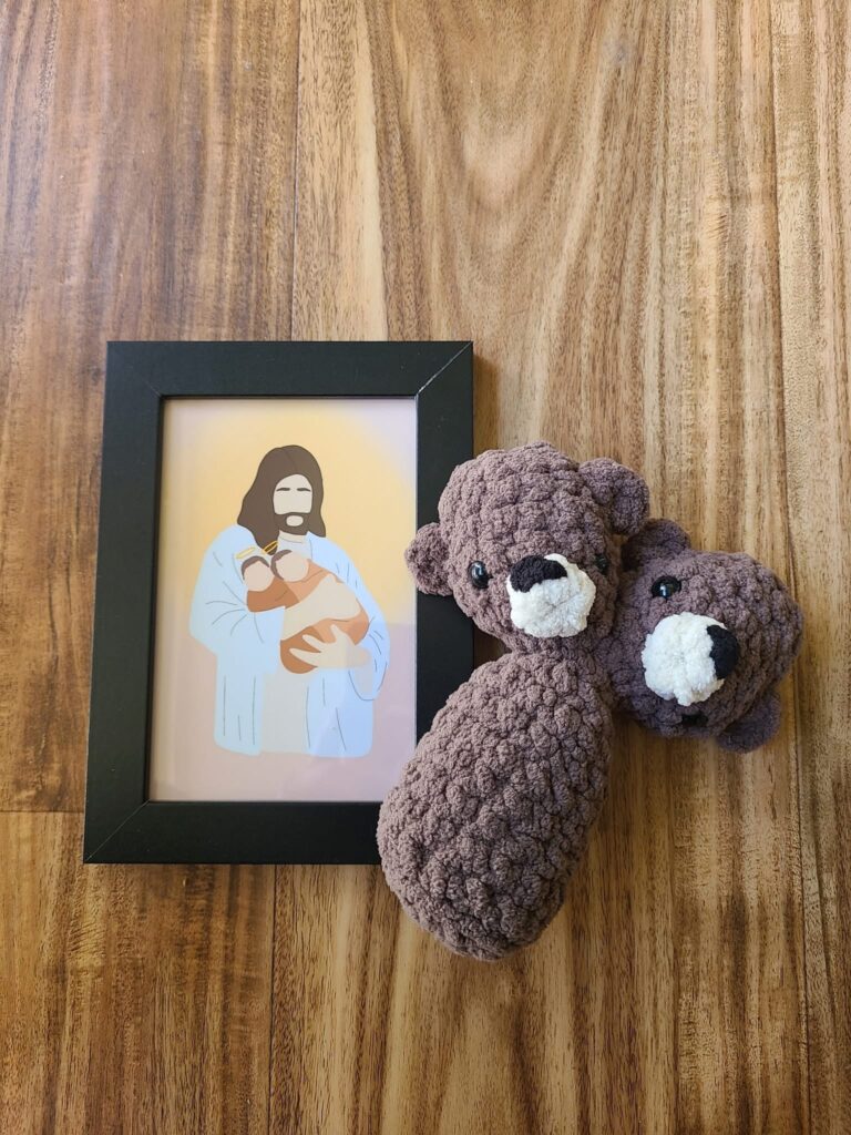 A teddy bear toy with not one but two heads to represent the conjoined girls